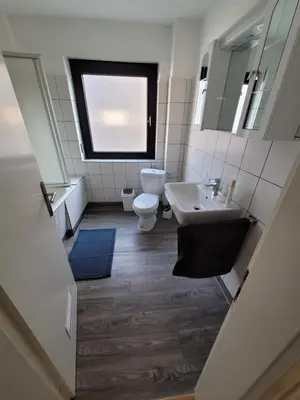 Ein Badezimmer in der Unterkunft City Apartment KL