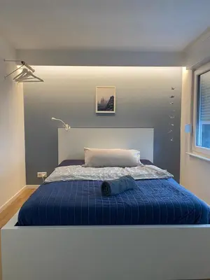 Ein Bett oder Betten in einem Zimmer der Unterkunft Ferienwohnung an der Nagold - Liebeneckstraße EG