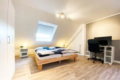 Ein Bett oder Betten in einem Zimmer der Unterkunft Work & Stay House