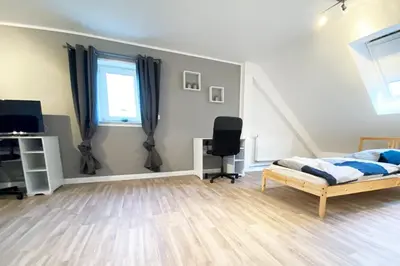 Ein Bett oder Betten in einem Zimmer der Unterkunft Work & Stay House