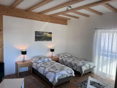 Ein Bett oder Betten in einem Zimmer der Unterkunft Ferienwohnungen Auf der Höhe