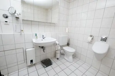 Ein Badezimmer in der Unterkunft Maisonette 2