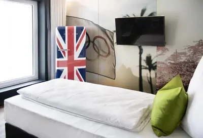 Ein Bett oder Betten in einem Zimmer der Unterkunft STO Hotel by WMM Hotels