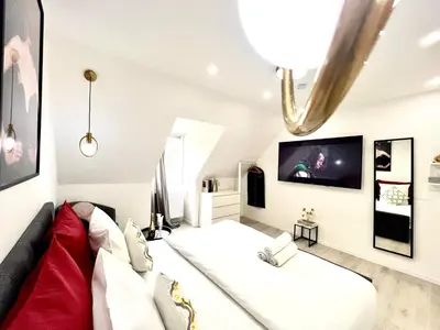 Ein Bett oder Betten in einem Zimmer der Unterkunft Living Solution 24 Karlsruhe