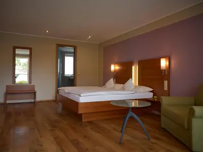 Ein Bett oder Betten in einem Zimmer der Unterkunft Gästehaus Reßler