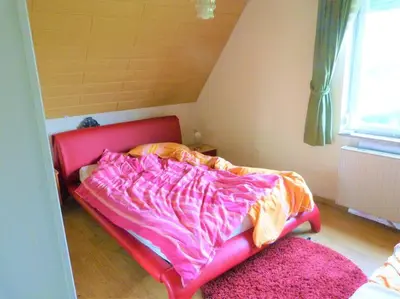 Ein Bett oder Betten in einem Zimmer der Unterkunft Bauernhof Obersulm-Eschenau Schwäb.Toskana