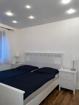 Ein Bett oder Betten in einem Zimmer der Unterkunft Lilli`s Ferienwohnung