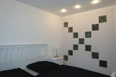 Ein Bett oder Betten in einem Zimmer der Unterkunft Lilli`s Ferienwohnung