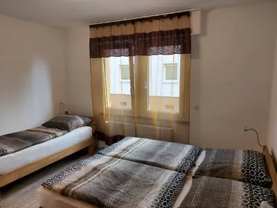 Ein Bett oder Betten in einem Zimmer der Unterkunft Ferienwohnung Popp