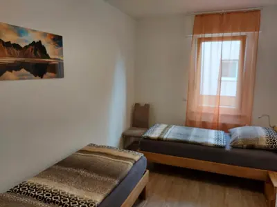 Ein Bett oder Betten in einem Zimmer der Unterkunft Ferienwohnung Popp