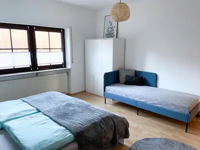 Ein Bett oder Betten in einem Zimmer der Unterkunft Ferienwohnung Burgpanorama