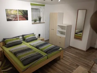 Ein Bett oder Betten in einem Zimmer der Unterkunft Ferienwohnung Monika Scholtz
