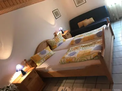 Ein Bett oder Betten in einem Zimmer der Unterkunft Ferienwohnung Meyer