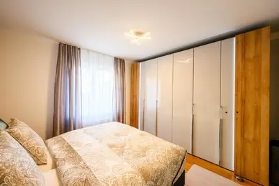 Ein Bett oder Betten in einem Zimmer der Unterkunft Komfort Deluxe
