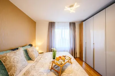 Ein Bett oder Betten in einem Zimmer der Unterkunft Komfort Deluxe