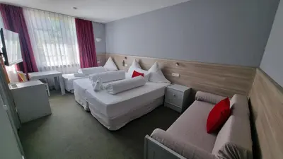 Ein Bett oder Betten in einem Zimmer der Unterkunft MATZ Brunnenhof