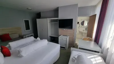 Ein Bett oder Betten in einem Zimmer der Unterkunft MATZ Brunnenhof