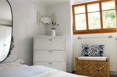 Ein Bett oder Betten in einem Zimmer der Unterkunft Loblocher Max und Moritz