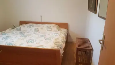 Ein Bett oder Betten in einem Zimmer der Unterkunft Georgs Ferienwohnung