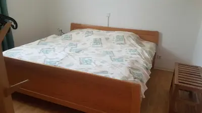 Ein Bett oder Betten in einem Zimmer der Unterkunft Georgs Ferienwohnung