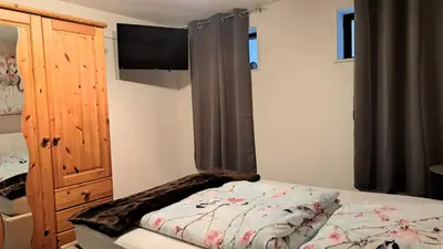 Ein Bett oder Betten in einem Zimmer der Unterkunft Ferienwohnung Jasmin in Schönau bei Heidelberg FEWO 4 Souterrain