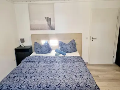 Ein Bett oder Betten in einem Zimmer der Unterkunft Cosy Apartment in Groß-Rohrheim – 87 m² – Sunny Terrace