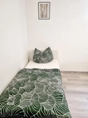 Ein Bett oder Betten in einem Zimmer der Unterkunft Cosy Apartment in Groß-Rohrheim – 87 m² – Sunny Terrace