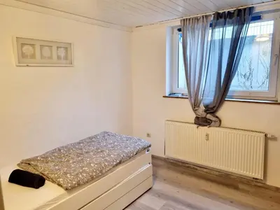 Ein Bett oder Betten in einem Zimmer der Unterkunft Cosy Apartment in Groß-Rohrheim – 87 m² – Sunny Terrace