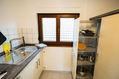 Küche/Küchenzeile in der Unterkunft Große 3-Zimmer Maisonette Wohnung in Neuhausen