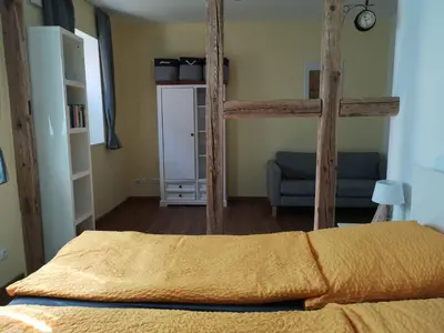 Ein Bett oder Betten in einem Zimmer der Unterkunft gemütliches Sandsteinhaus