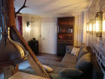 Ein Sitzbereich in der Unterkunft Appartement Altstadt, Gasthaus Hirsch