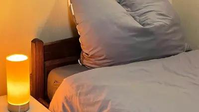 Ein Bett oder Betten in einem Zimmer der Unterkunft FeWo, Monteurwohnung Pauline