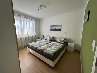 Ein Bett oder Betten in einem Zimmer der Unterkunft Pfälzer Traumblick