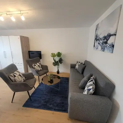 Ein Sitzbereich in der Unterkunft Große,Schöne FeWo nähe Schwetzingen-Hockenheim 3 Zimmer mit Balkon