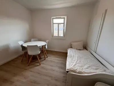 Ein Bett oder Betten in einem Zimmer der Unterkunft Monteurzimmer Reuhl - Ferienwohnungen Rodenstein