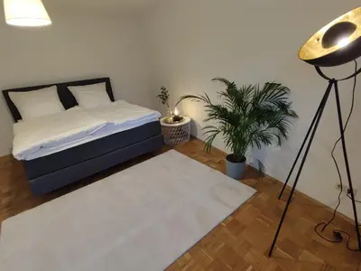 Ein Bett oder Betten in einem Zimmer der Unterkunft ZEN Apartments - Exklusive Suite - Luxus - Boxspringbett