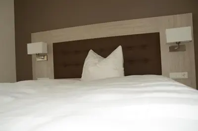 Ein Bett oder Betten in einem Zimmer der Unterkunft Pension die kleine Träumerei
