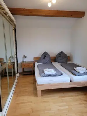 Ein Bett oder Betten in einem Zimmer der Unterkunft Ferienhaus Vongerichten
