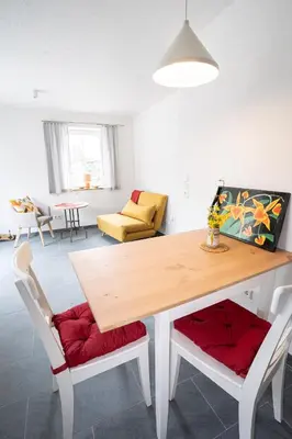 Ein Sitzbereich in der Unterkunft Gästehaus Großhöchberg