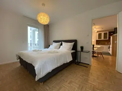 Ein Bett oder Betten in einem Zimmer der Unterkunft Acapella Suite Adagio 54qm, direkt am Weinberg, Altstadt, Netflix inklusive