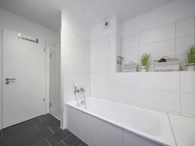 Ein Badezimmer in der Unterkunft Acapella Suite Barcarolle 60qm, direkt am Weinberg, Altstadt, Netflix inklusive