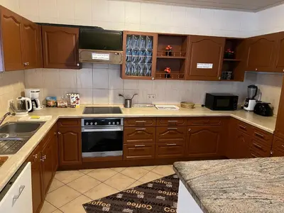 Küche/Küchenzeile in der Unterkunft Ferienappartements Dolgesheim 2