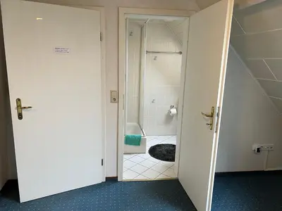Ein Badezimmer in der Unterkunft Ferienappartements Dolgesheim 3