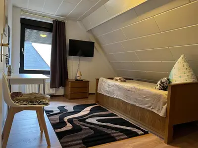 Ein Bett oder Betten in einem Zimmer der Unterkunft Ferienappartements Dolgesheim 3