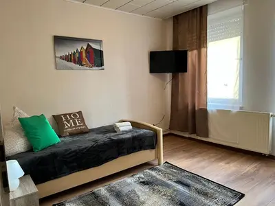 Ein Bett oder Betten in einem Zimmer der Unterkunft Ferienappartements Dolgesheim 4