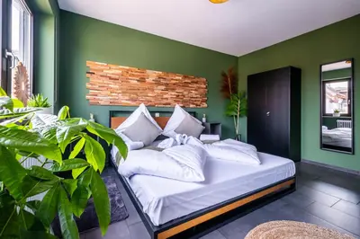Ein Bett oder Betten in einem Zimmer der Unterkunft Design Studio Karlsruhe Durlach - Stylisches Apartment 70qm Altstadt