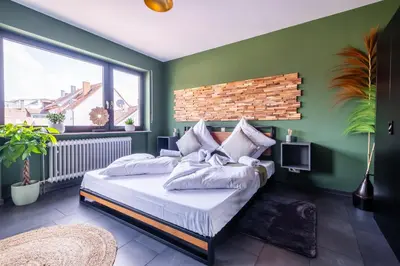 Ein Bett oder Betten in einem Zimmer der Unterkunft Design Studio Karlsruhe Durlach - Stylisches Apartment 70qm Altstadt