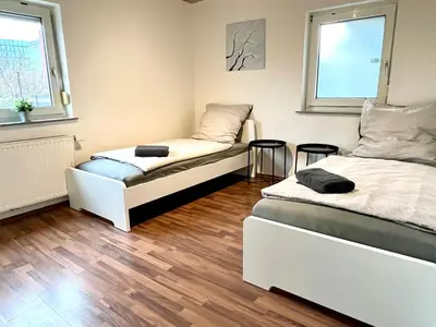 Ein Bett oder Betten in einem Zimmer der Unterkunft Apartment Neckarsulm