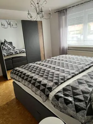 Ein Bett oder Betten in einem Zimmer der Unterkunft Herz der Weinberge
