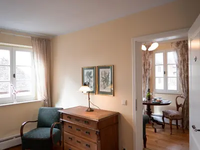 Ein Sitzbereich in der Unterkunft REFUGIUM Theresienstraße 19 - Chambre Monet